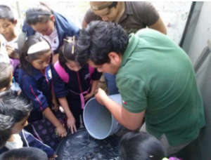 University Autonomous of Querétaro Engineering students teaching elementary students on sanitation and BSF construction and use in a near by village of Colon.