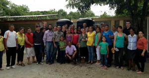 Community residents and project partners from the DR and Purdue University at the Ribbon-Cutting ceremony for the water treatment system at the Ana Julia School in Las Canas.